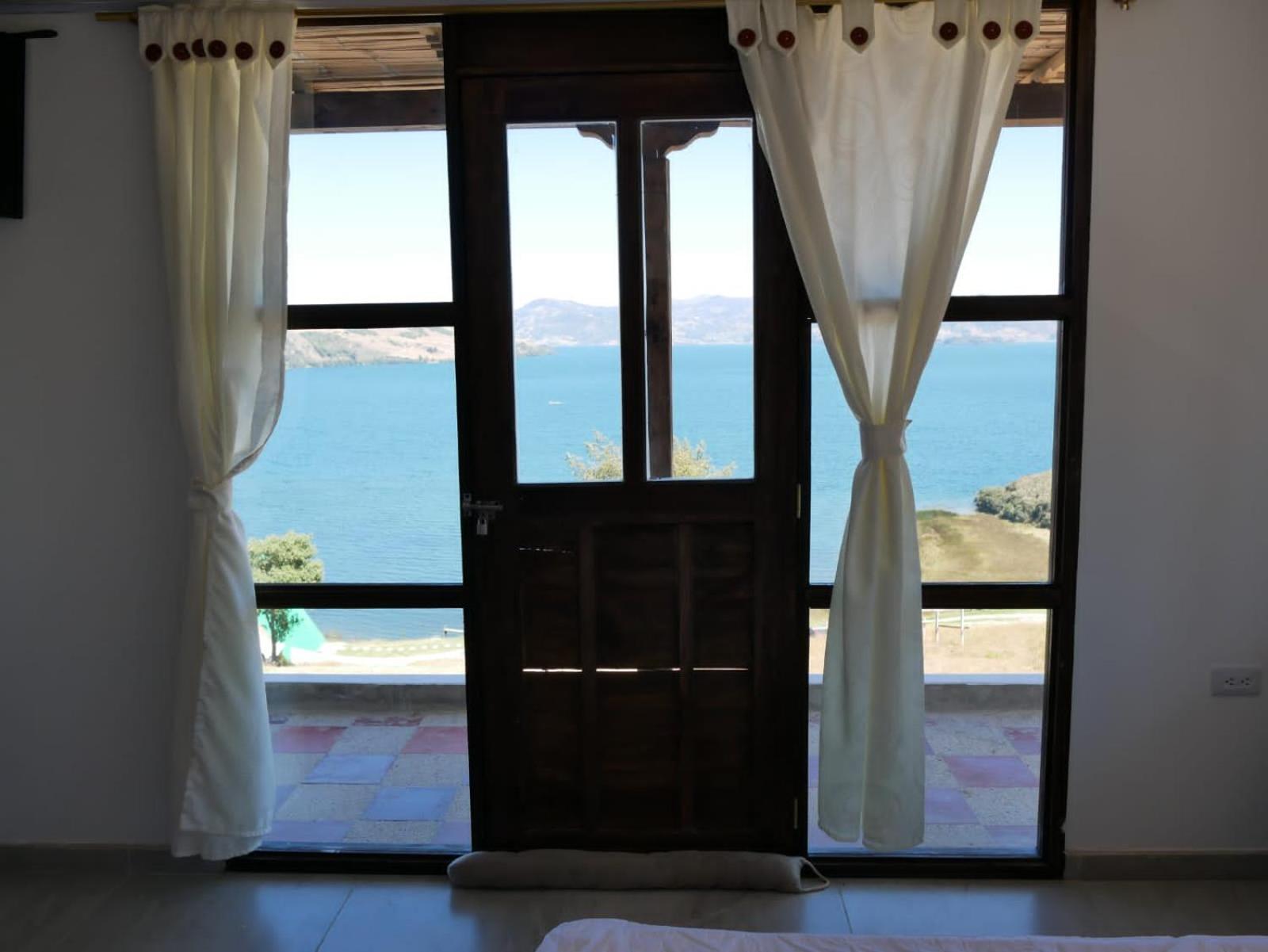 Hotel Tota Eliseo Playa Blanca Lago De Тота Екстер'єр фото